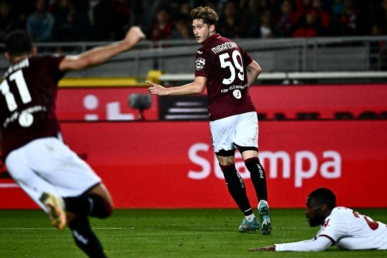 Torino beat Milan to hand leaders Napoli title advantage