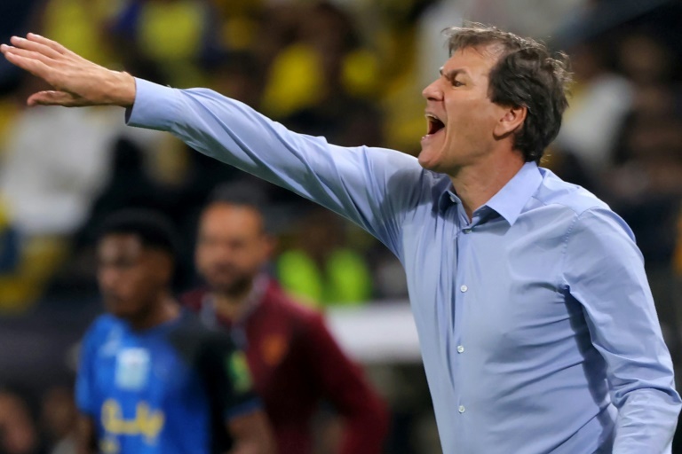 New coach Garcia plays down Napoli's Serie A title hopes