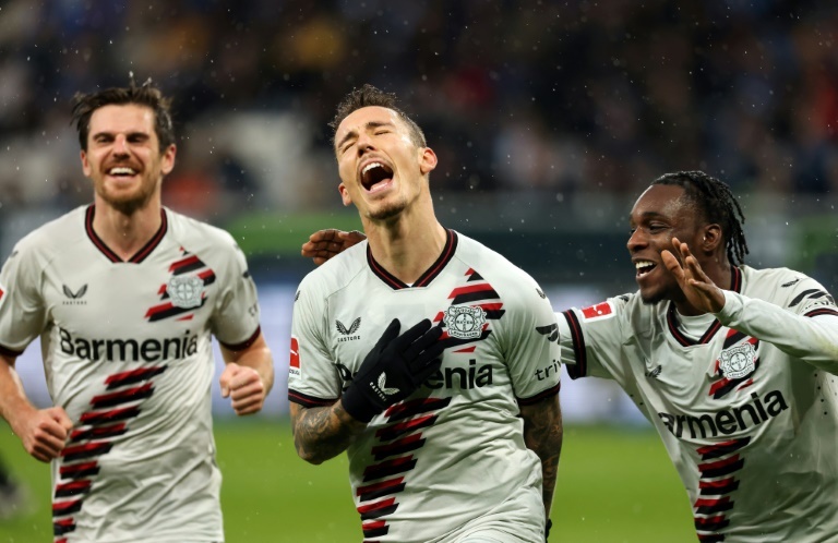 Grimaldo doubles up to take leaders Leverkusen five clear