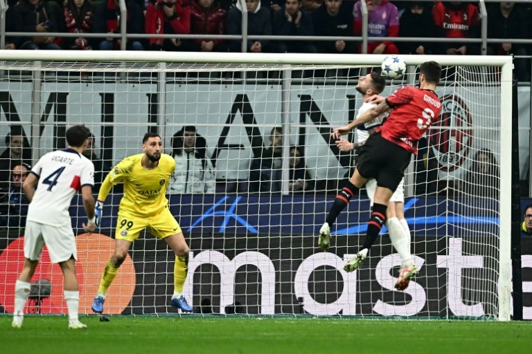 Giroud sinks troubled PSG to reignite Milan's Champions League bid