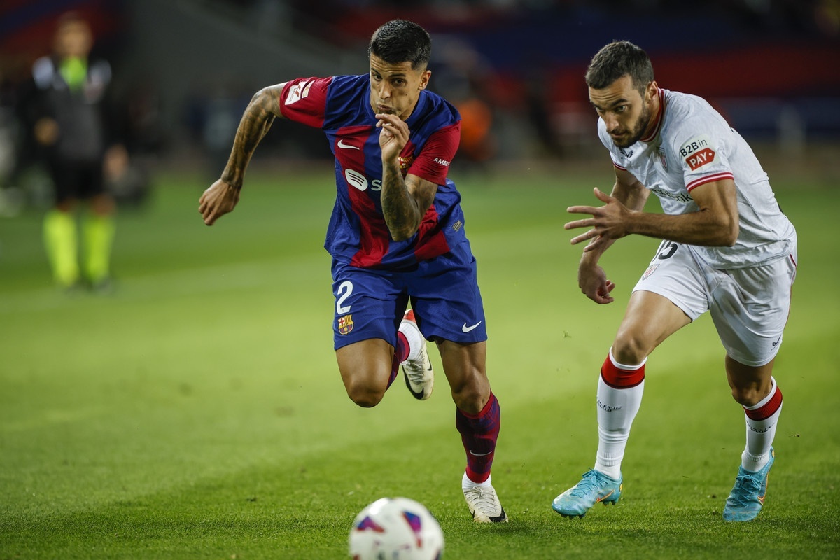 Barca's Cancelo out of Super Cup and several weeks on the sidelines