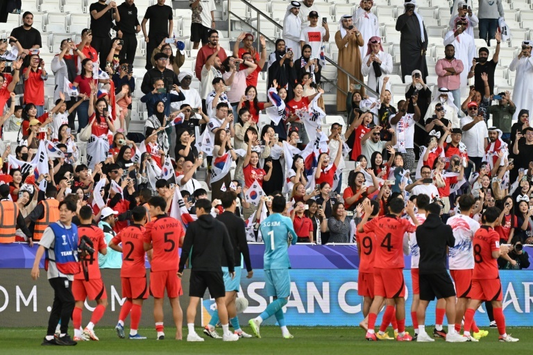 Son fluffs lines but S.Korea, Iraq win openers at Asian Cup