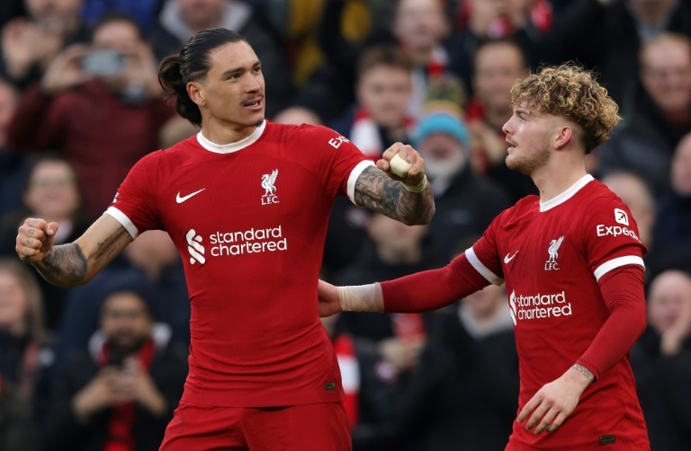 Liverpool survive Burnley scare to regain top spot