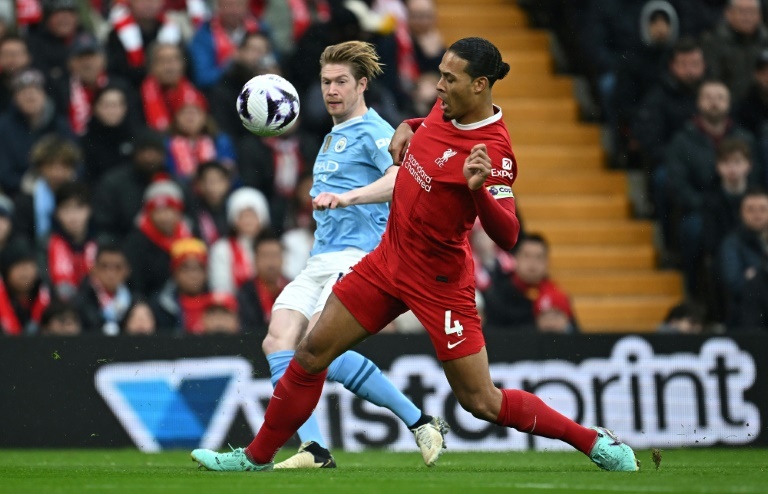 'Enjoy the ride', says Van Dijk as three-way Premier League title race tightens