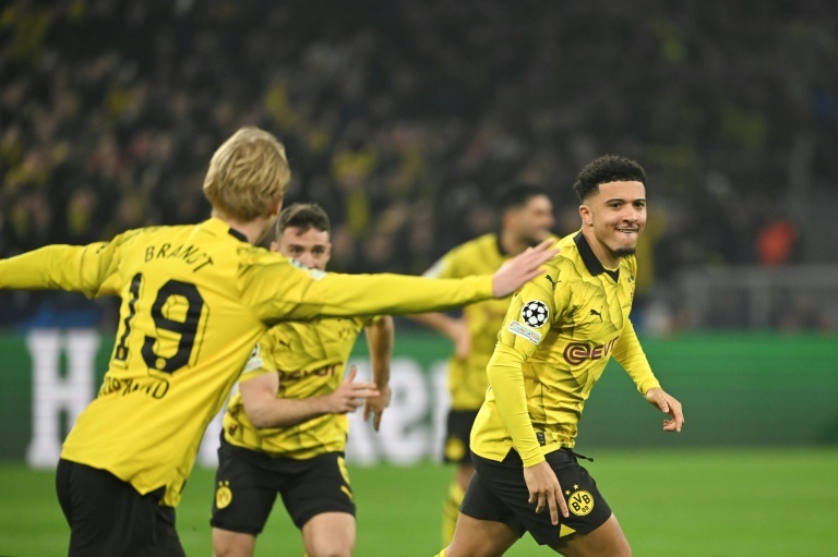 Sancho helps Dortmund past PSV, into Champions League quarters