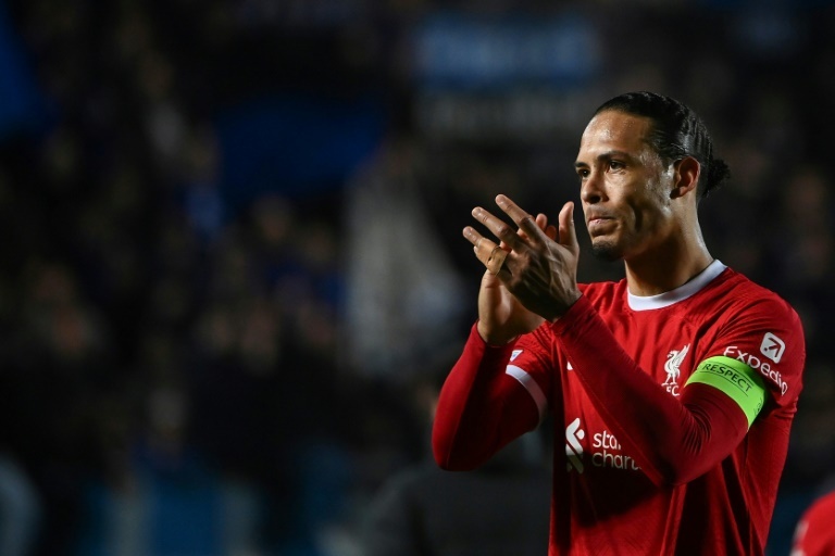 Van Dijk plans to stay on to aid Liverpool's 'big transition'