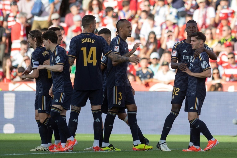 Swaggering champions Madrid rout relegated Granada