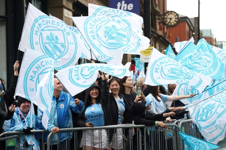 Guardiola vows FA Cup revenge as City celebrate title triumph