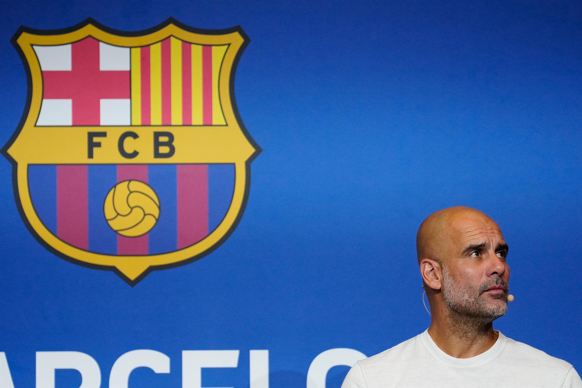 Man City's Guardiola closes door to coaching Barcelona again