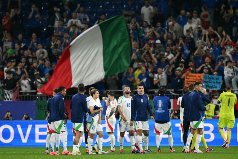 Italy down after Spain humbling, but not out