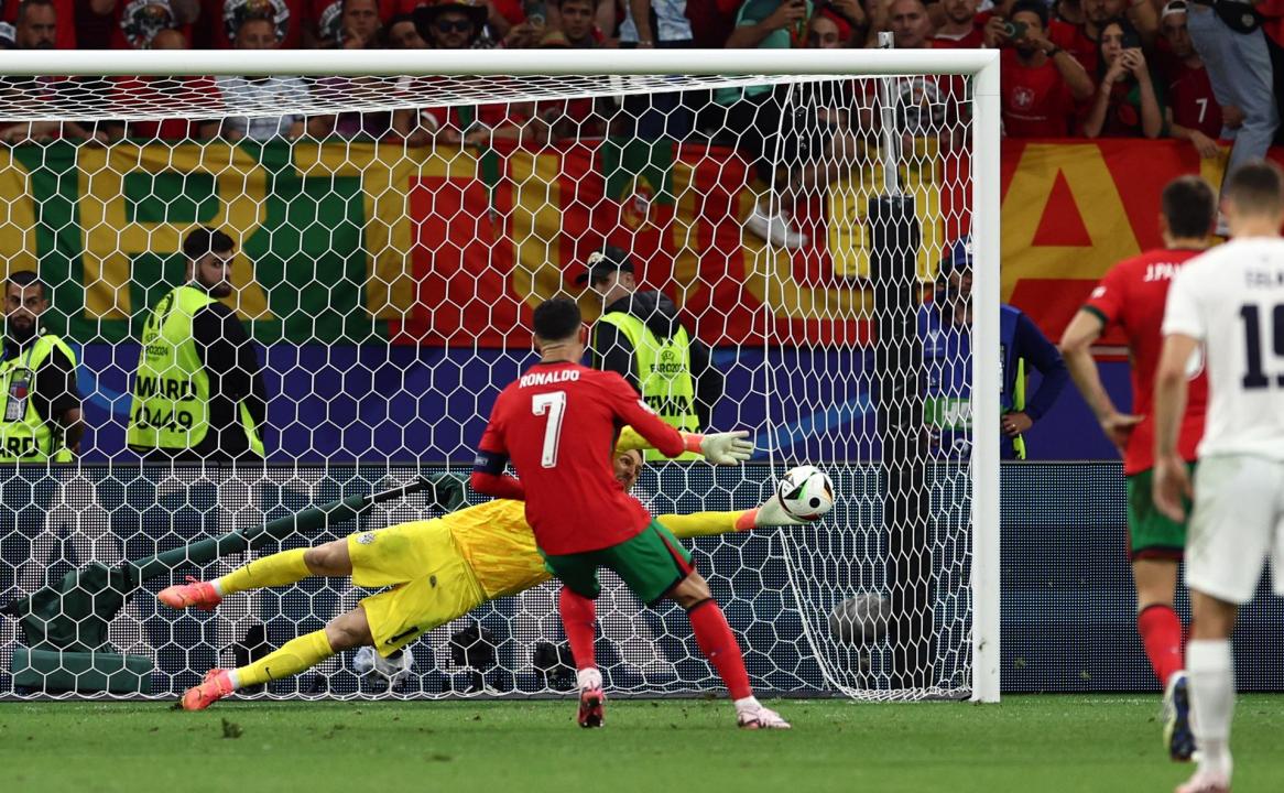 Super Costa saves Portugal on penalties to reach Euros quarters