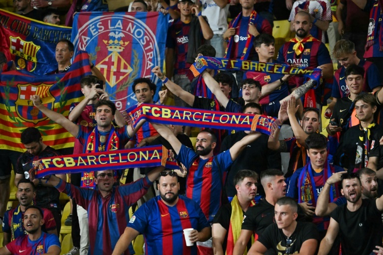 Barca fans barred from Champions League away game over racist banner