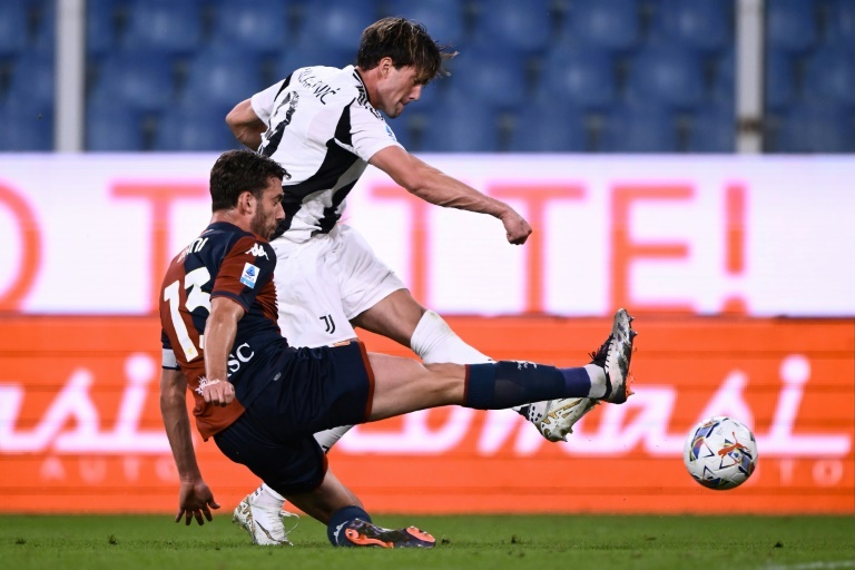 Rediscovered Vlahovic shoots Juve top with double at fan-less Genoa