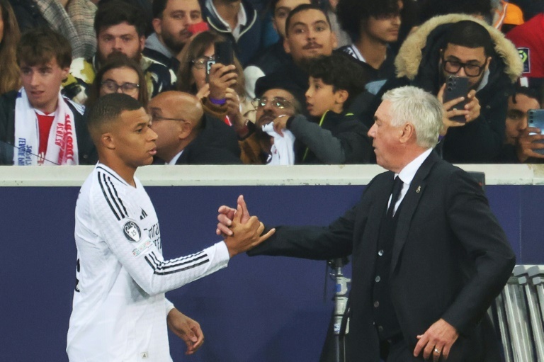 Ancelotti holds hands up as Real Madrid's long unbeaten run ends