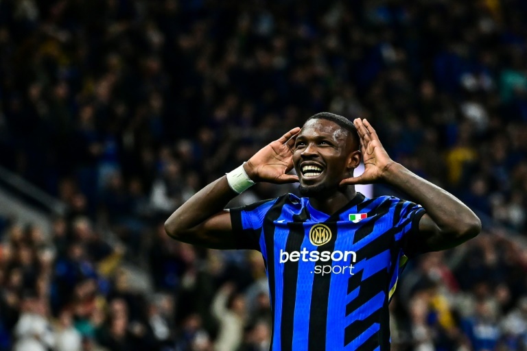 Thuram treble fires Inter past Torino and up to second