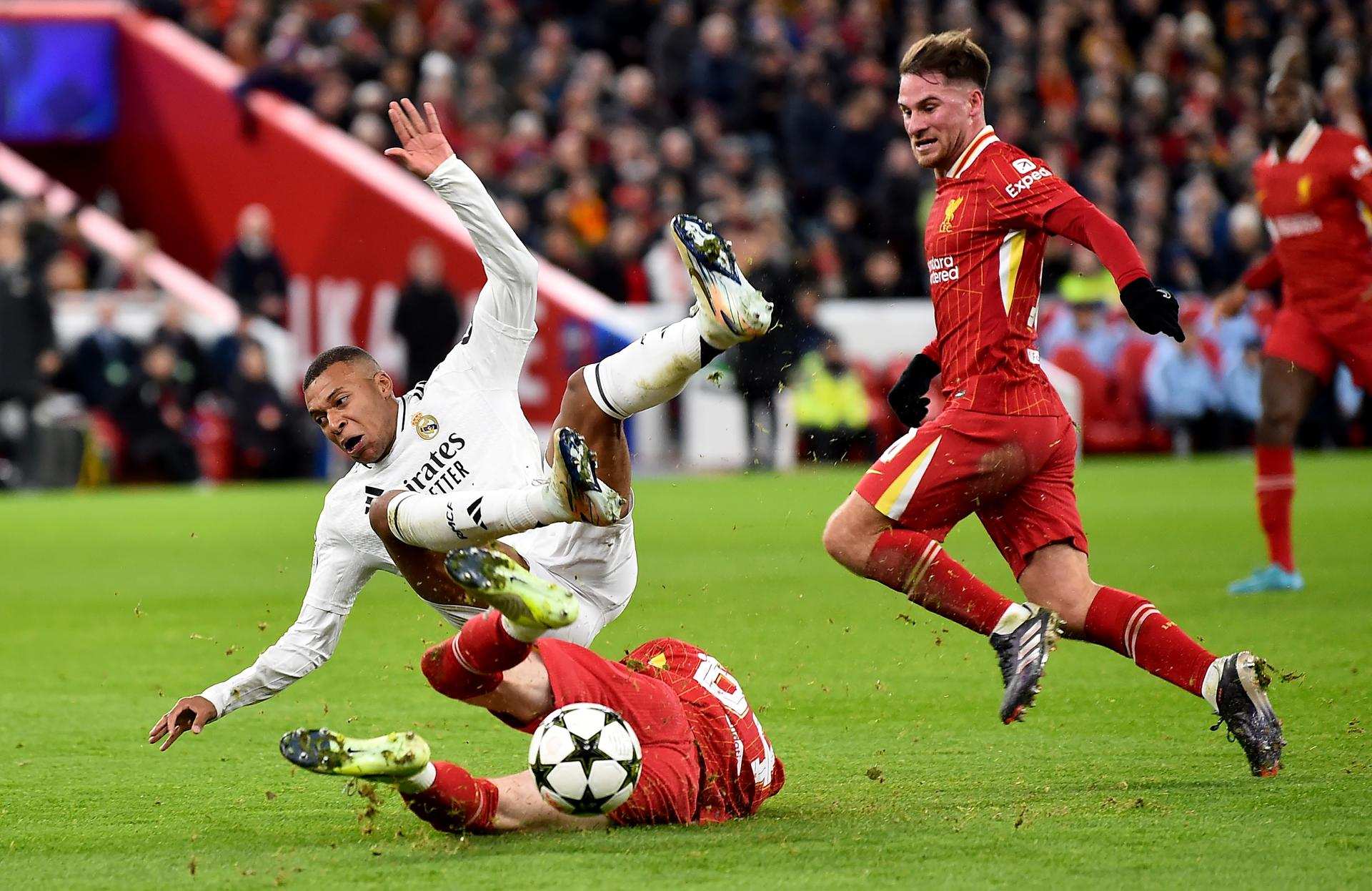 Liverpool crush languishing Madrid to maintain perfect record