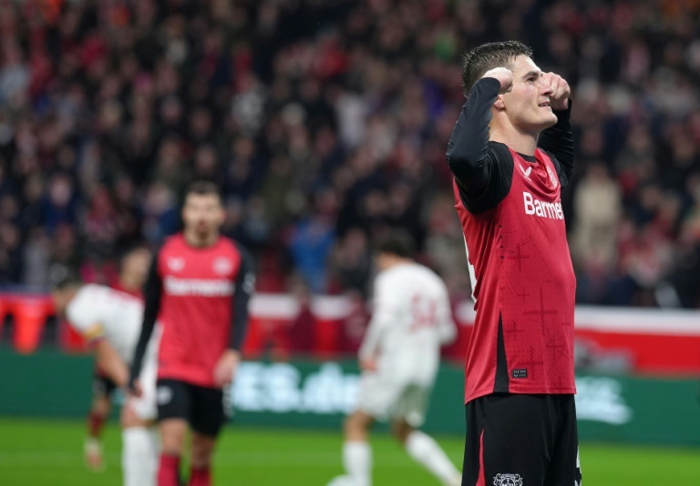 Schick hits four as Leverkusen close gap to Bayern on sombre weekend