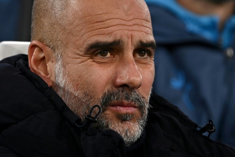 Guardiola insists he won't quit troubled Man City