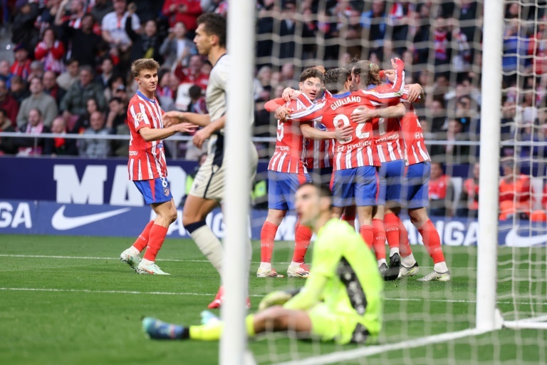 Relentless Atletico claim Liga lead with win over Osasuna