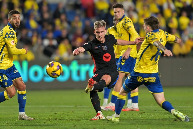 Barca claim narrow win at Las Palmas to reclaim Liga lead